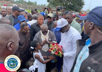 President Weah and entourage being welcomed in district #6Executive Mansion Photo