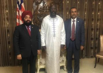 President Weah sandwiched by Indian Ambassador and Consul General JettyExecutive Mansion Photo