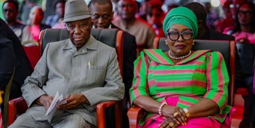 First Lady and President posed in a photograph